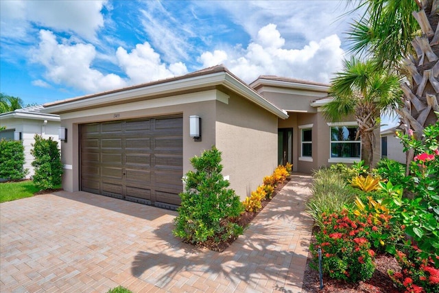 view of front of property with a garage