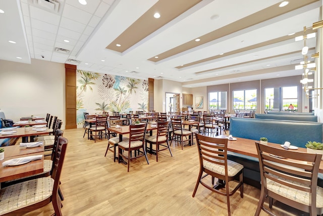 dining space with light wood-type flooring