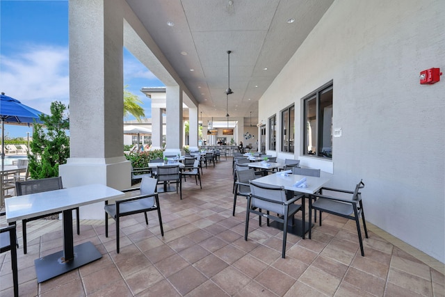 view of patio / terrace featuring ceiling fan