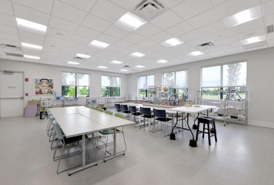 playroom featuring a paneled ceiling