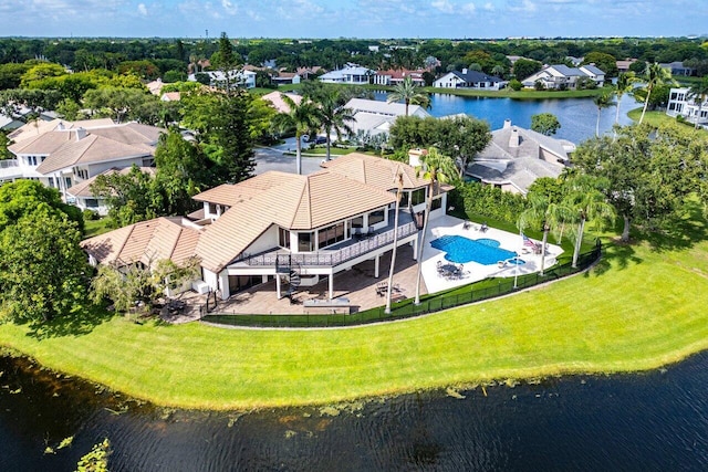 aerial view featuring a residential view and a water view