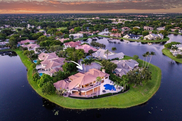 aerial view featuring a water view and a residential view