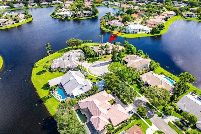 aerial view featuring a water view and a residential view