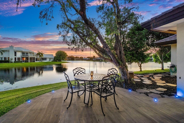 deck featuring a water view