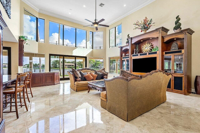 living area featuring marble finish floor, visible vents, crown molding, and ceiling fan