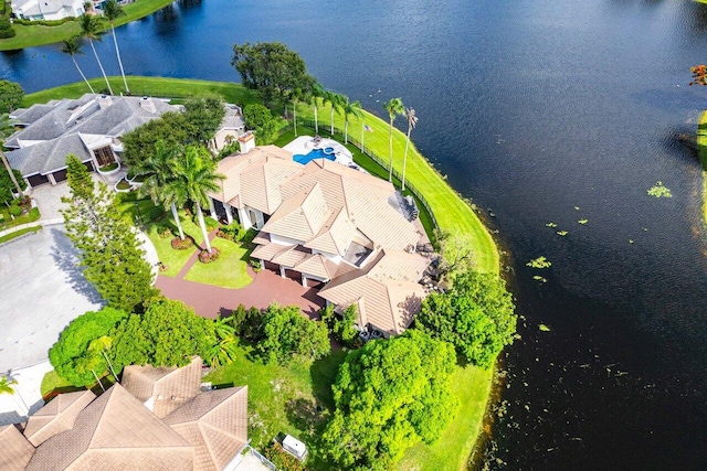 birds eye view of property featuring a water view and a residential view