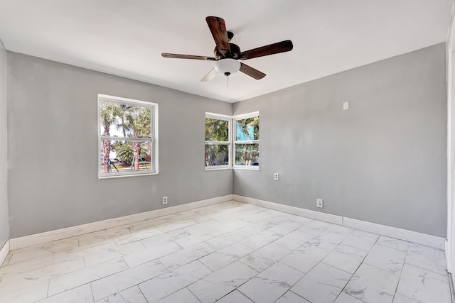 empty room featuring ceiling fan