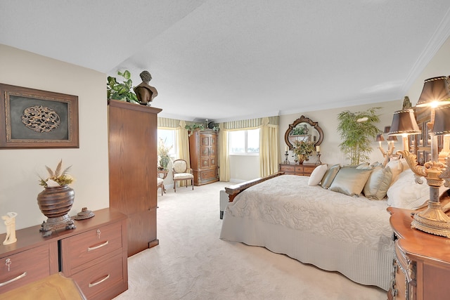 bedroom featuring light carpet, crown molding, and lofted ceiling