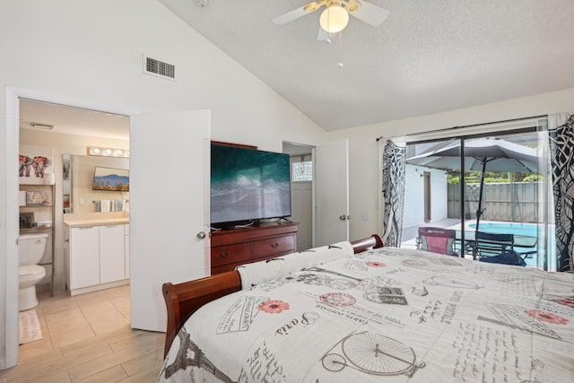 bedroom with high vaulted ceiling, access to outside, ensuite bath, ceiling fan, and a textured ceiling