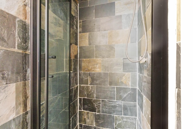 bathroom with an enclosed shower