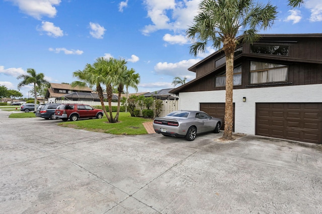 view of property exterior with a garage