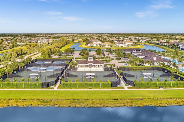 bird's eye view with a water view and a residential view