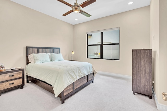 bedroom with light carpet and ceiling fan