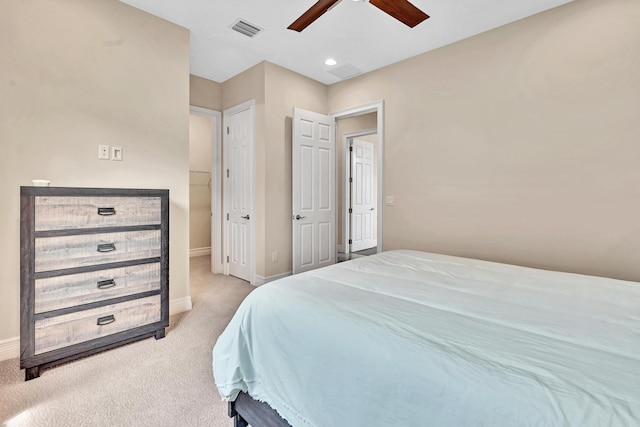 bedroom with a ceiling fan, carpet, visible vents, and baseboards