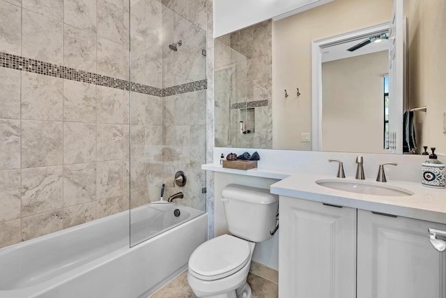 full bath with toilet, tile patterned floors, vanity, and shower / bathing tub combination