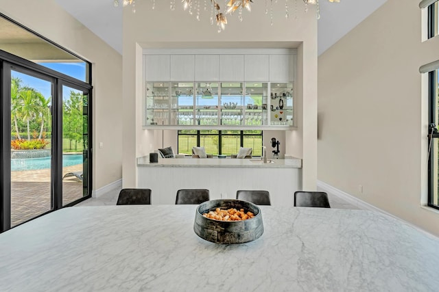 interior space with a chandelier