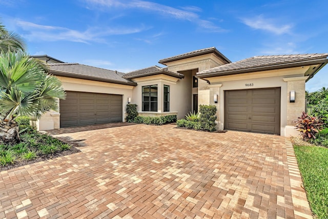 prairie-style house featuring a garage