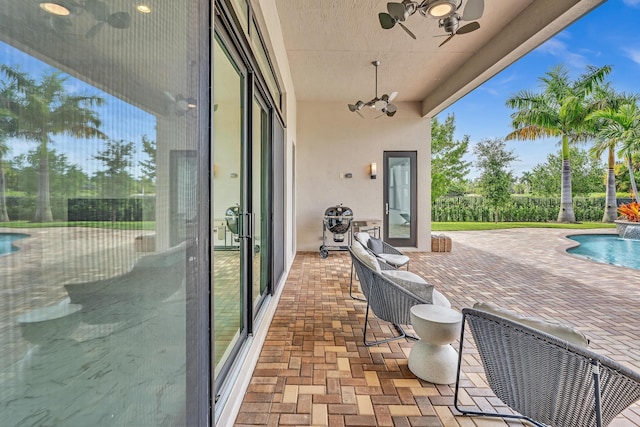 view of patio / terrace with a fenced in pool