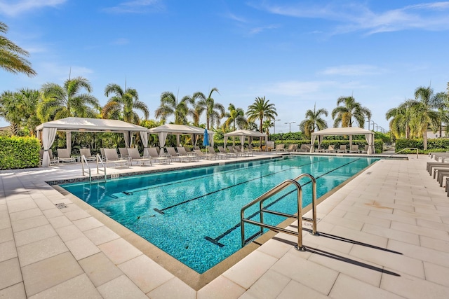 view of pool featuring a patio and a gazebo