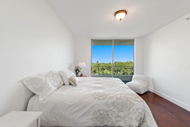 bedroom featuring dark hardwood / wood-style floors