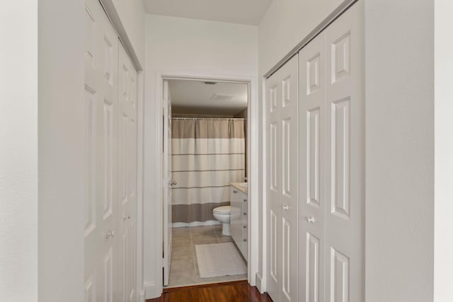 hall featuring dark hardwood / wood-style flooring