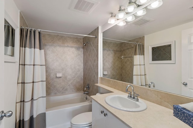 full bathroom featuring shower / bath combination with curtain, vanity, and toilet