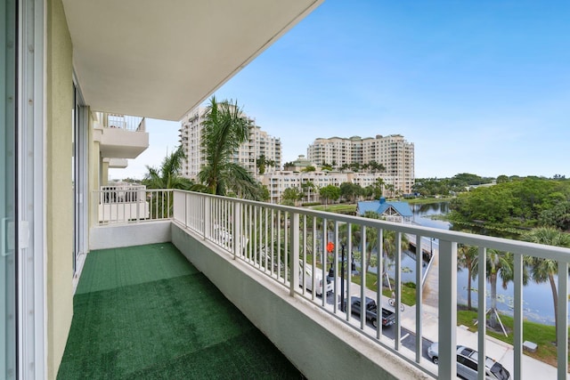 balcony featuring a water view