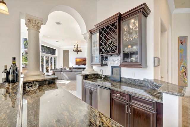 dining space with a chandelier and crown molding