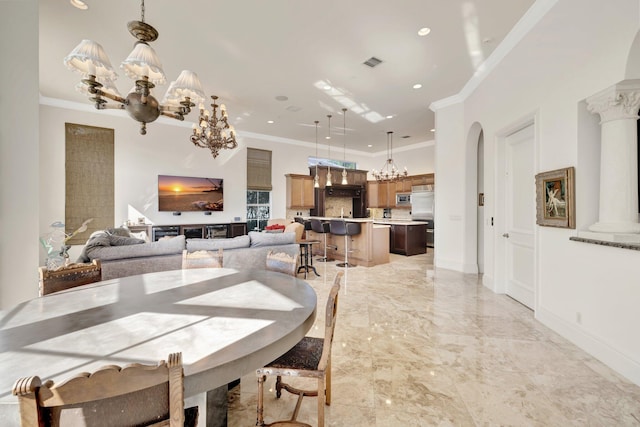 living room with wine cooler, a high ceiling, a notable chandelier, and ornamental molding