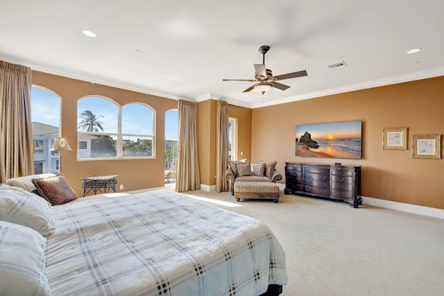 bedroom featuring ceiling fan, light colored carpet, and ornamental molding