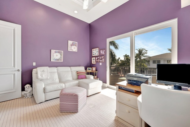 office space with light colored carpet, sink, and a high ceiling