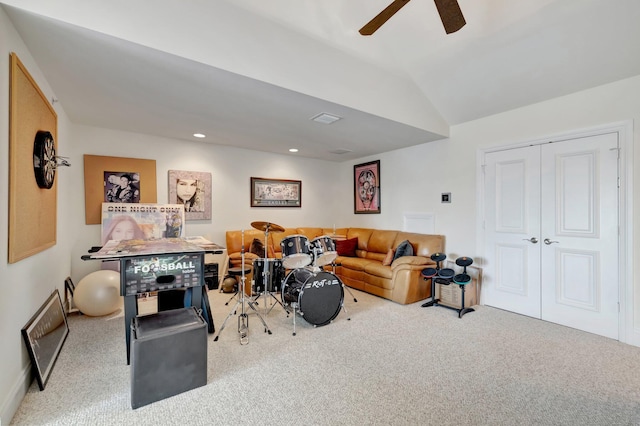 recreation room featuring light colored carpet, ceiling fan, and lofted ceiling