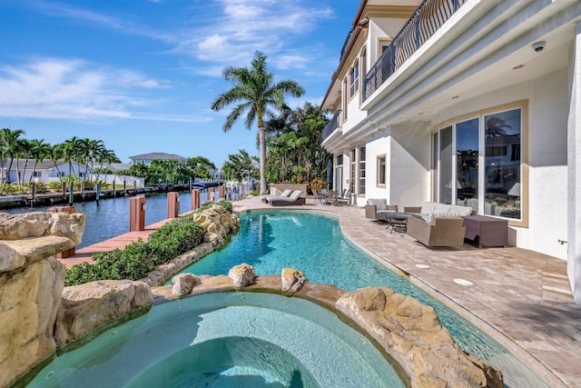 view of dock with a water view