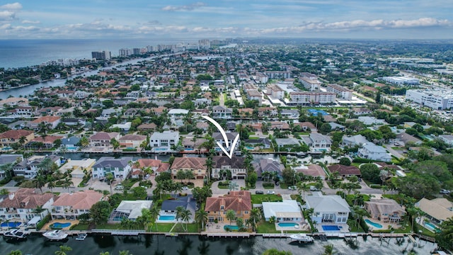 drone / aerial view with a water view