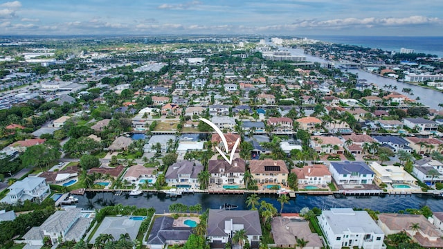 bird's eye view with a water view