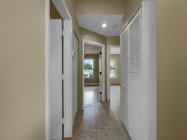 hallway with light tile patterned floors