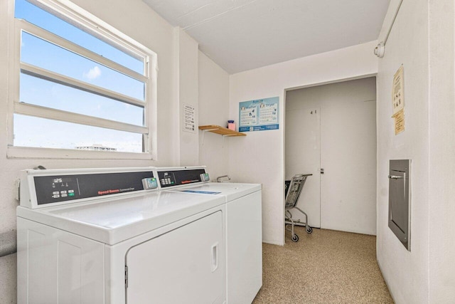 laundry area with washer and clothes dryer