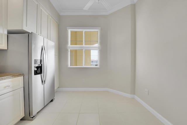 kitchen featuring ceiling fan, ornamental molding, stainless steel fridge with ice dispenser, and white cabinets