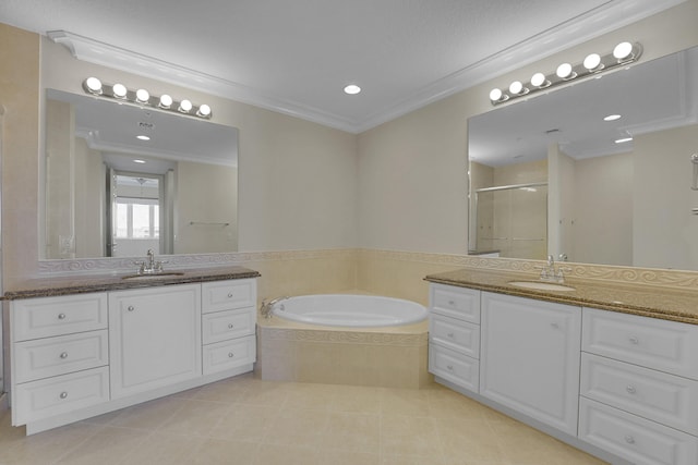 bathroom with plus walk in shower, ornamental molding, tile patterned floors, and vanity