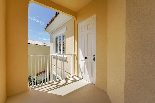 entrance to property featuring a balcony