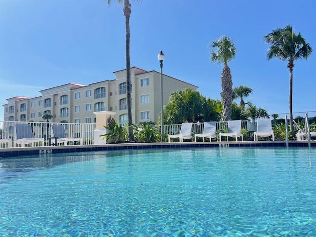 community pool with fence