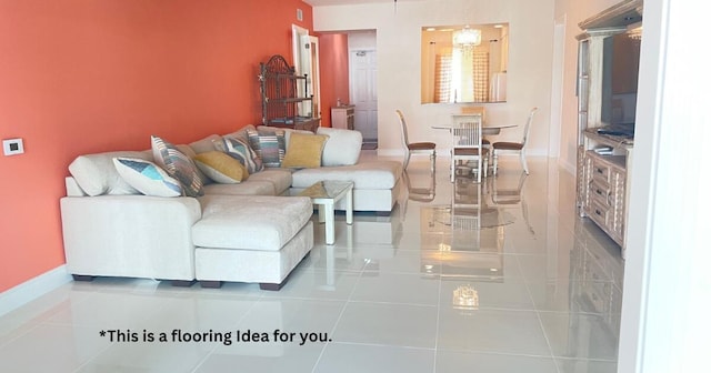 living room featuring baseboards and tile patterned flooring