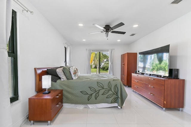 tiled bedroom with ceiling fan