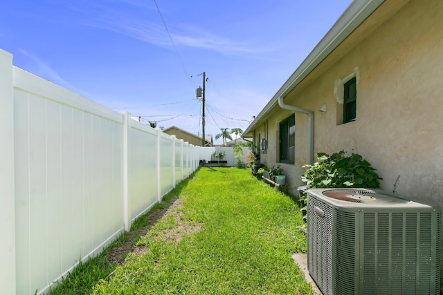 view of yard featuring central AC unit