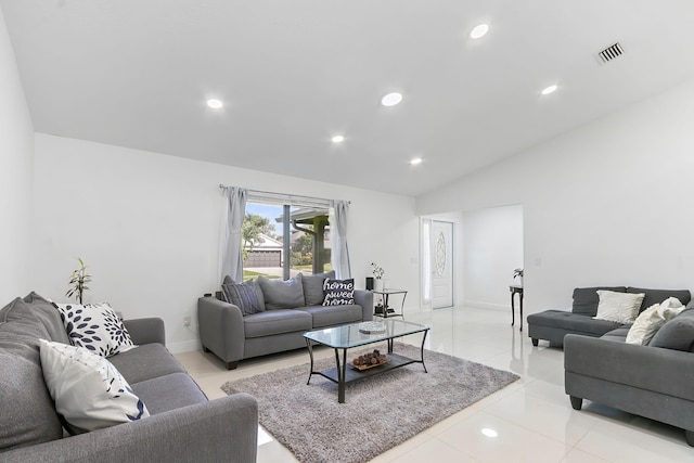 tiled living room featuring lofted ceiling