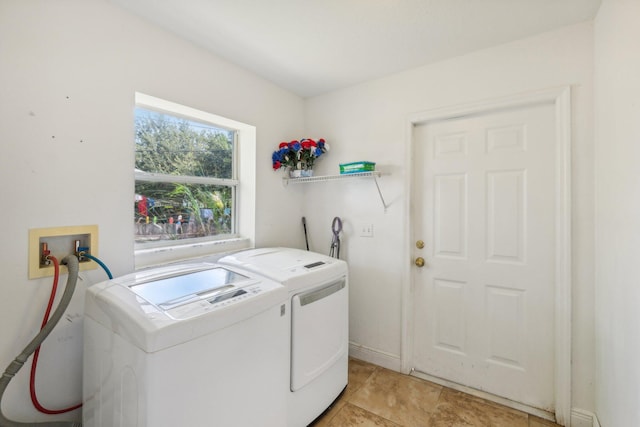 clothes washing area featuring independent washer and dryer, washer hookup, and light tile floors