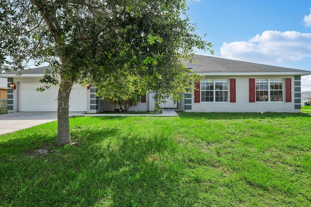 view of front of home with a garage and a front yard