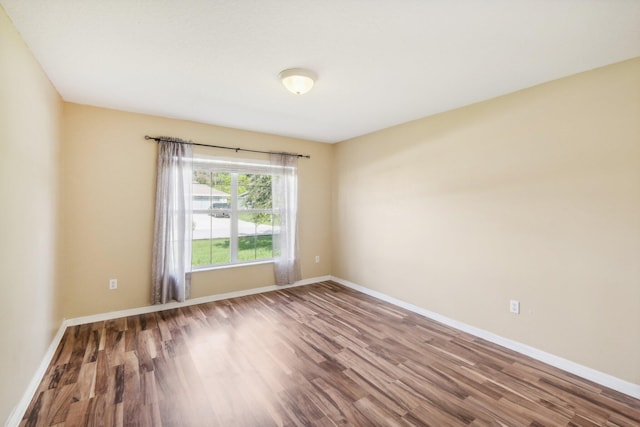 empty room featuring hardwood / wood-style floors