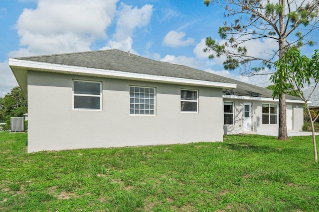 view of property exterior with a lawn