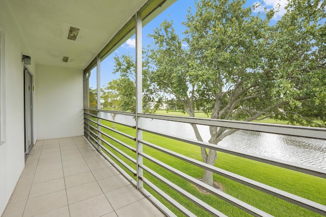 balcony featuring a water view